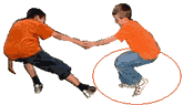A player stands in a circle. Another player tries to pull him out of the circle with a rope.