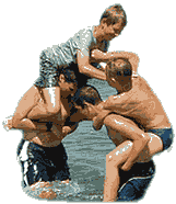 This water game is played like a chicken fight, only it is played in shallow water. 