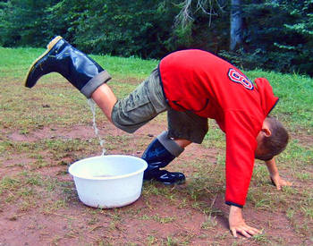 Games with gumboots: Participants must be transported water in their rubber boots.